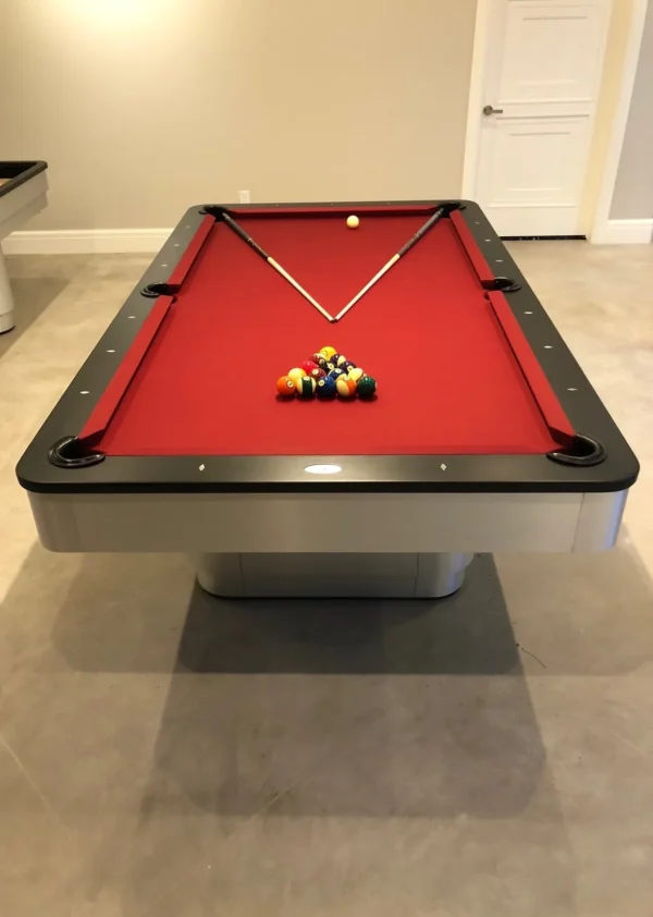 A pool table in a room with a red cloth. Item # GW5088-PT