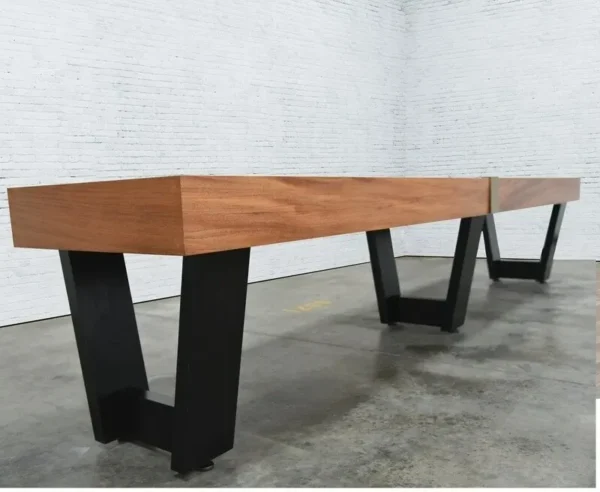 A wooden bench with black legs and a wooden top, Item # VG6140-SH.