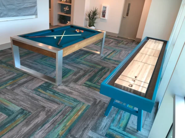 A game room with a pool table (Item # CM6024-SH) and shuffleboard.