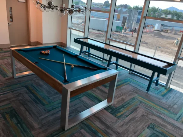 A pool table and shuffleboard table (Item # CM6027-SH) in an office.