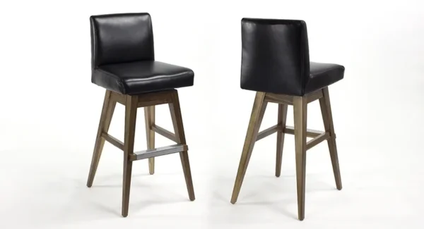 Two black bar stools on a white background.