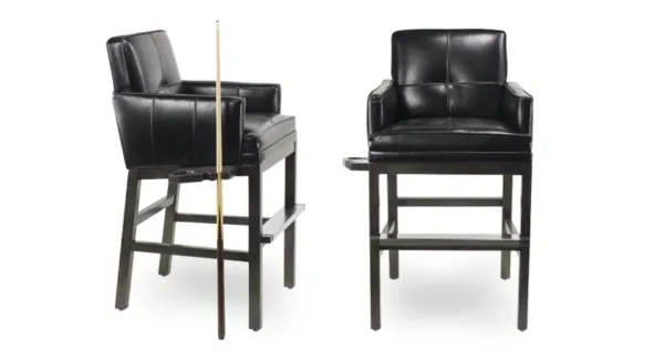 A pair of black leather bar stools.