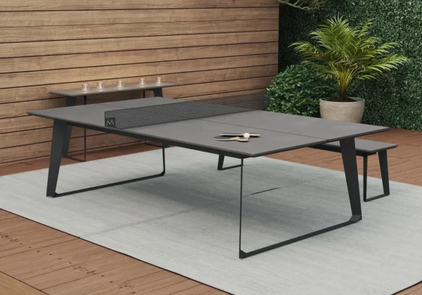 Ping pong table on a wooden deck.