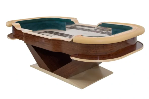 A casino table with a green and brown top.