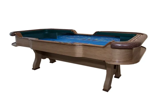 A casino table with a green table top.