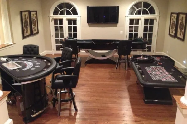 A game room with a table and chairs.