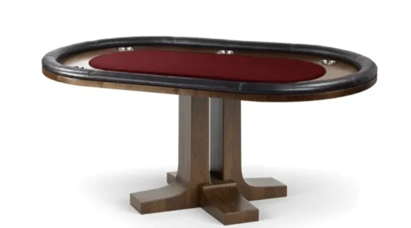 A poker table with a red cushion.