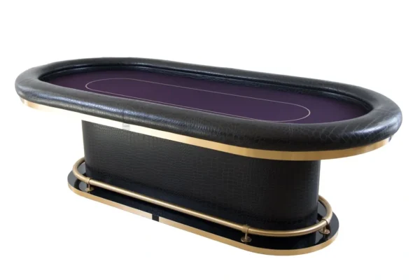 A poker table with purple leather and gold trim.