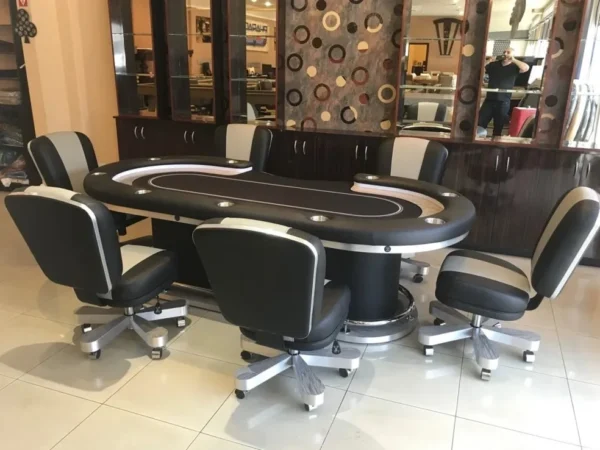 A poker table and chairs in a store.