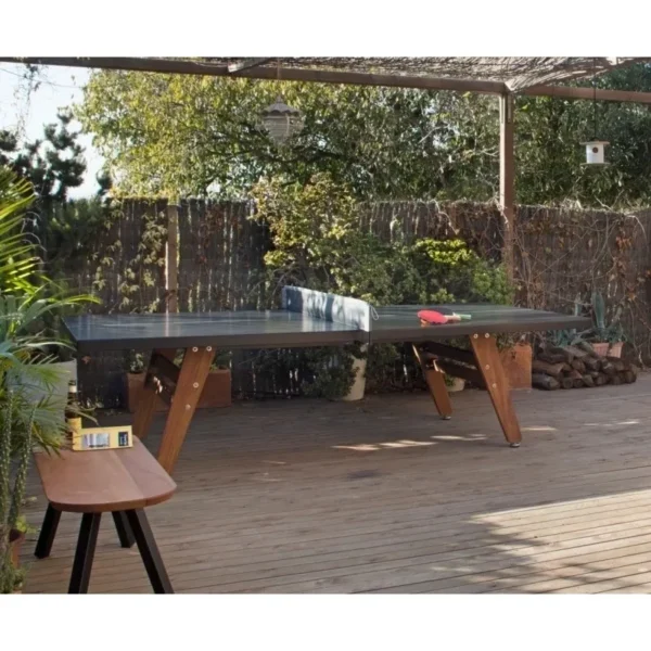 Ping pong table on a wooden deck.
