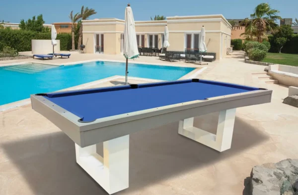 A pool table with a blue cloth in front of a pool.