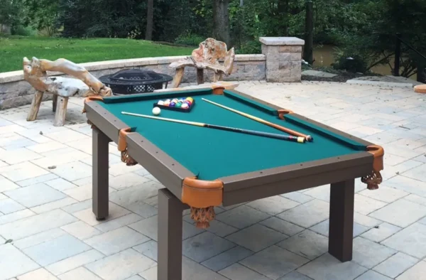 A pool table on a patio.
