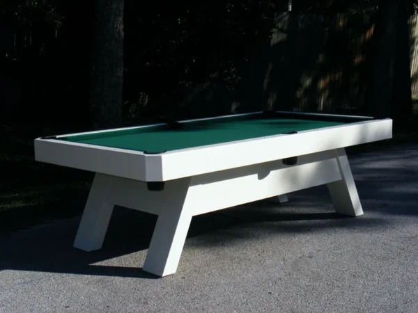 A white pool table with a green cloth.