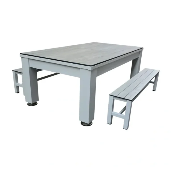 A table with two benches and a grey table top.