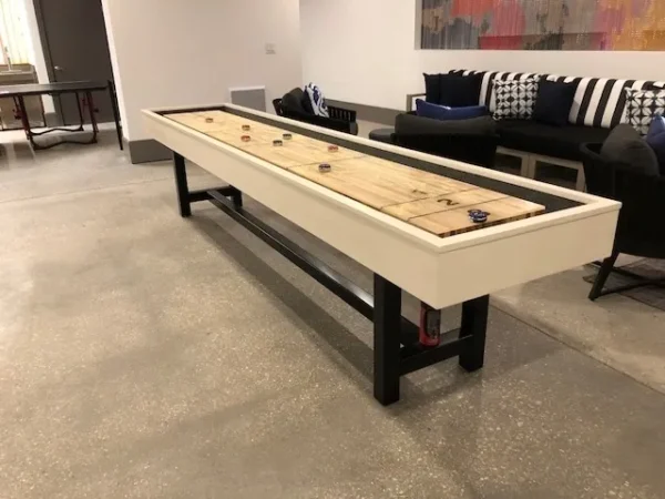 Shuffleboard table in a living room.