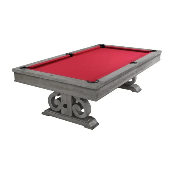 A pool table with a red cloth.