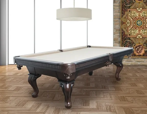 A billiard table in a room with a rug.