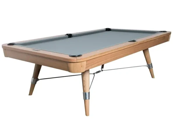 A pool table with a grey cloth and wooden legs.