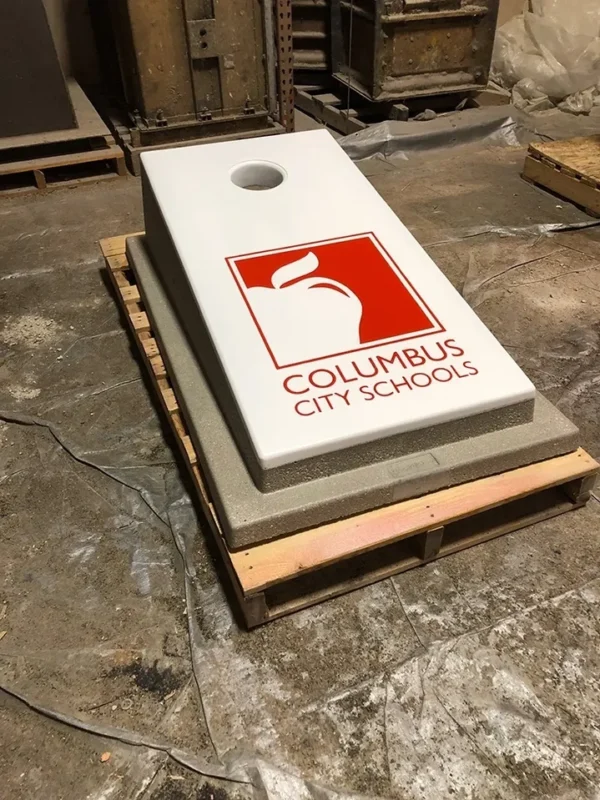 A cornhole game with the logo of columbus city leagues on it.