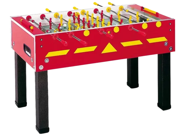 A foosball table with yellow and red balls.