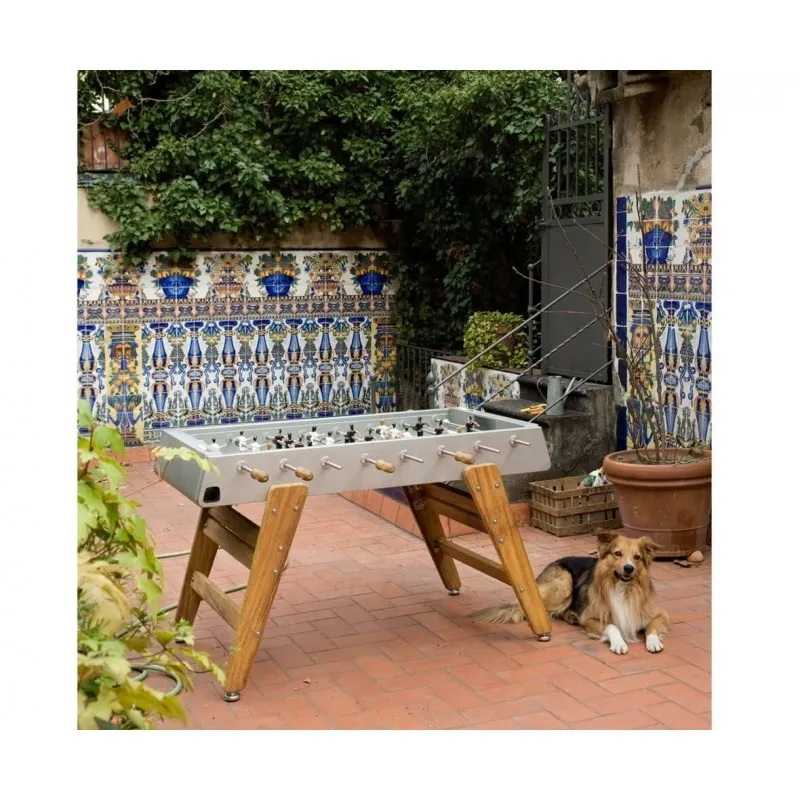 A dog sits next to the Item # MO17001-FB in a courtyard.