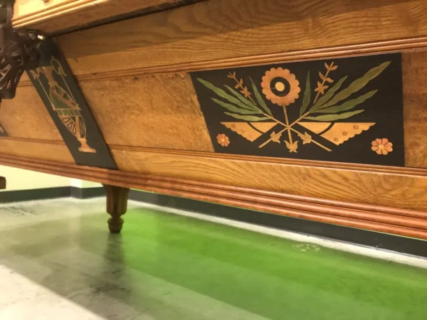 A wooden billiard table with floral designs on it, Item # BR19016-AT.