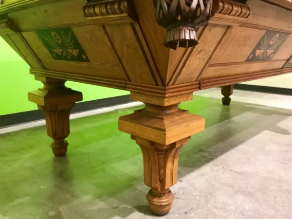 A pool table with Item # BR19017-AT on it.