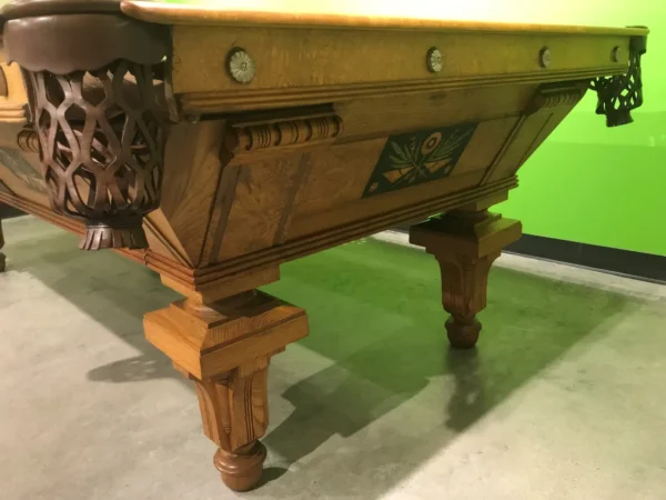 A pool table with Item # BR19019-AT on it.