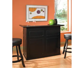 A minimalist Utem home bar setup featuring a dark wooden cabinet, two stools, and a framed abstract art piece, set against an orange wall with a window.