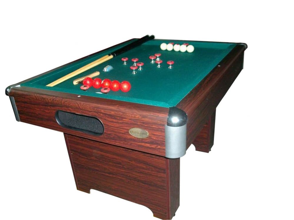 Item # BB5243-PT table with green felt, wooden frame, and equipment including cues and red and white balls arranged for a game, isolated on a white background.