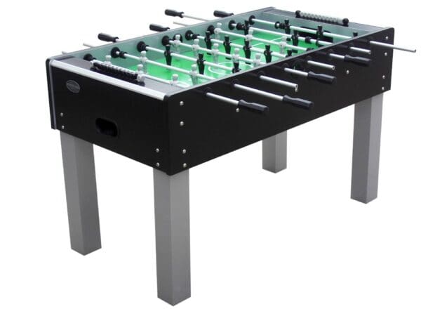 Black and gray foosball table with green field.