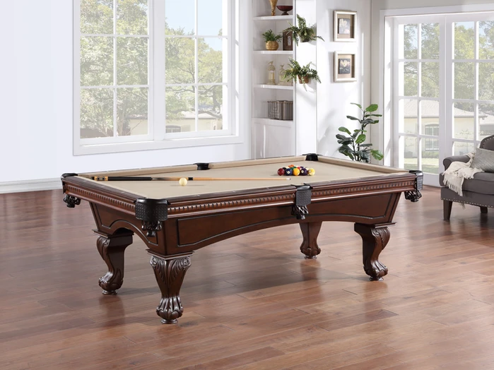 Brown pool table in a living room.