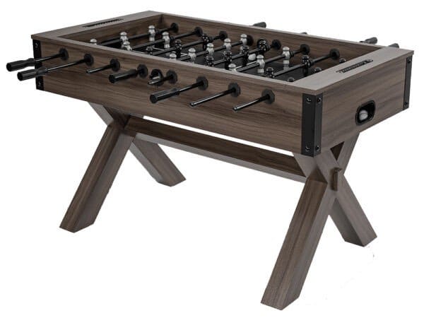 Wooden foosball table with black rods.