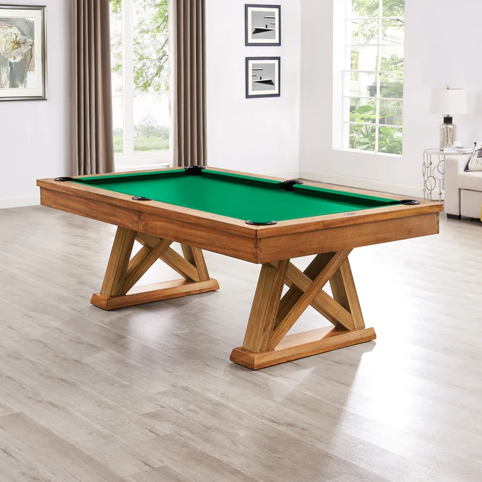 Wooden pool table with green felt.