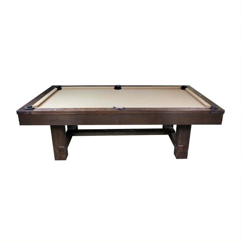 Dark wood pool table with tan felt.