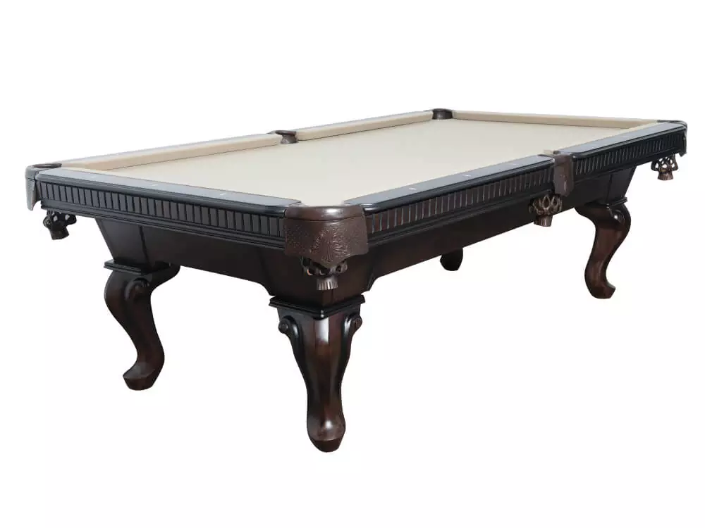 Dark wood pool table with beige felt.
