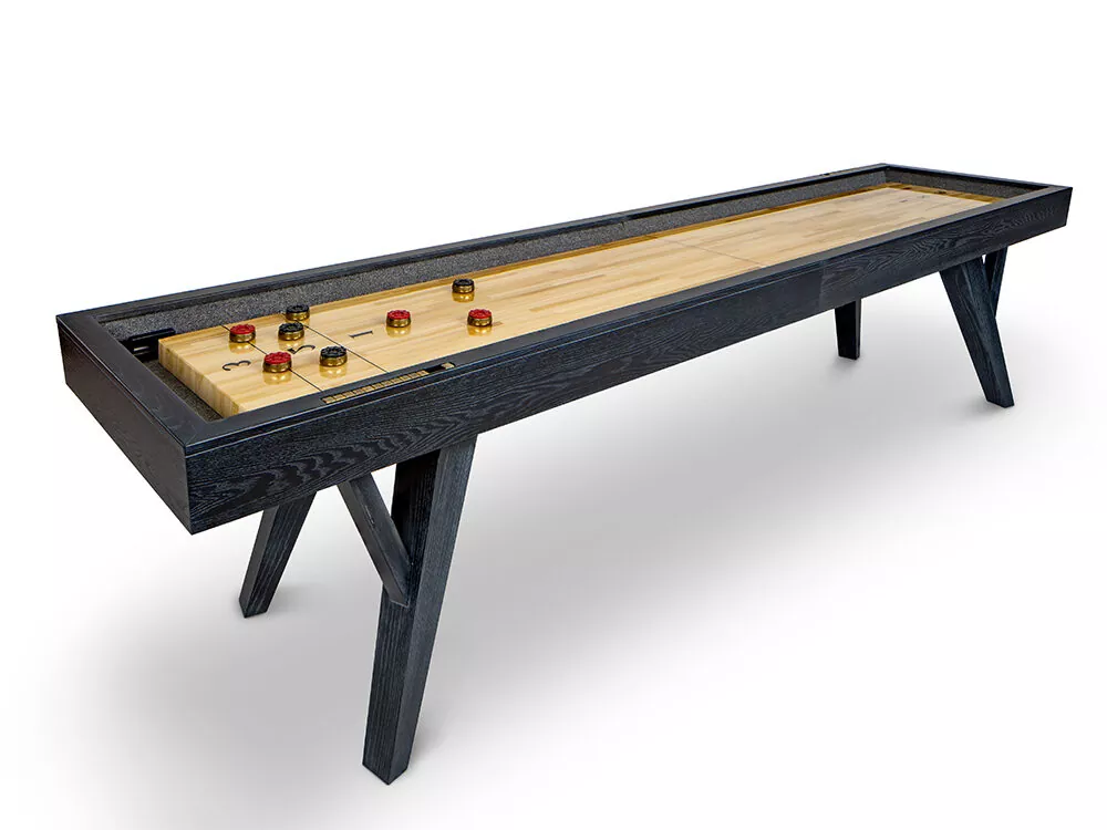 Black shuffleboard table with discs.