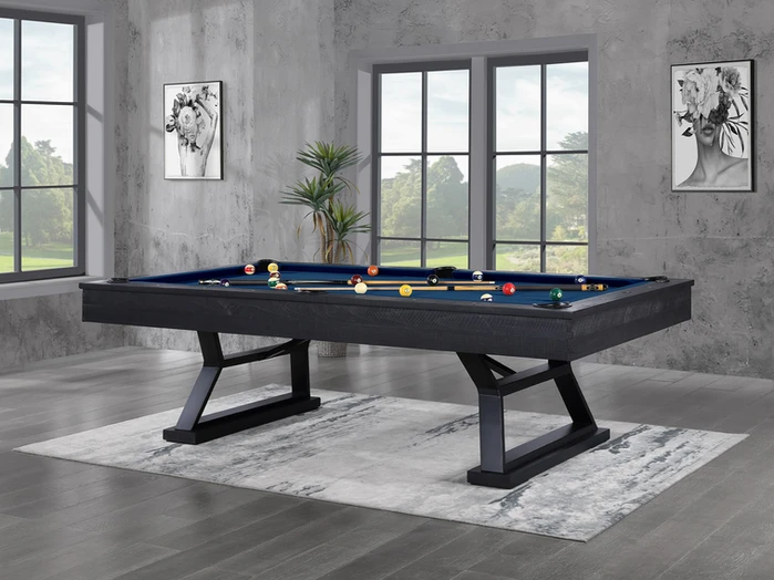 Modern black pool table with blue felt.