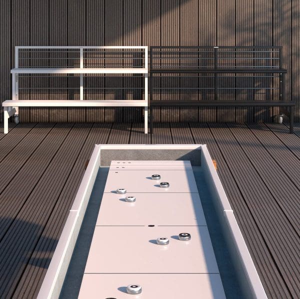 Outdoor shuffleboard game with benches.