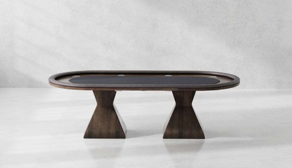 Dark wood poker table with black felt.